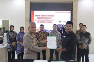 Waka polres menyerahkan pengawalan kepada PJ Bupati